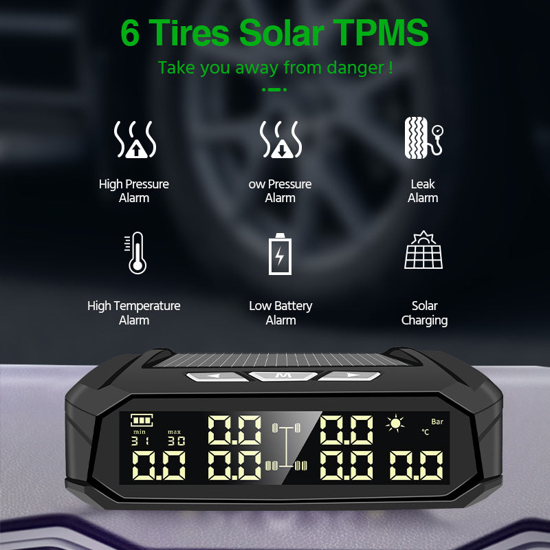 TPMS device with digital display and solar charging feature on a dark background