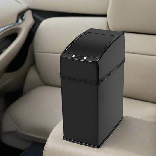 Black trash can on a white background