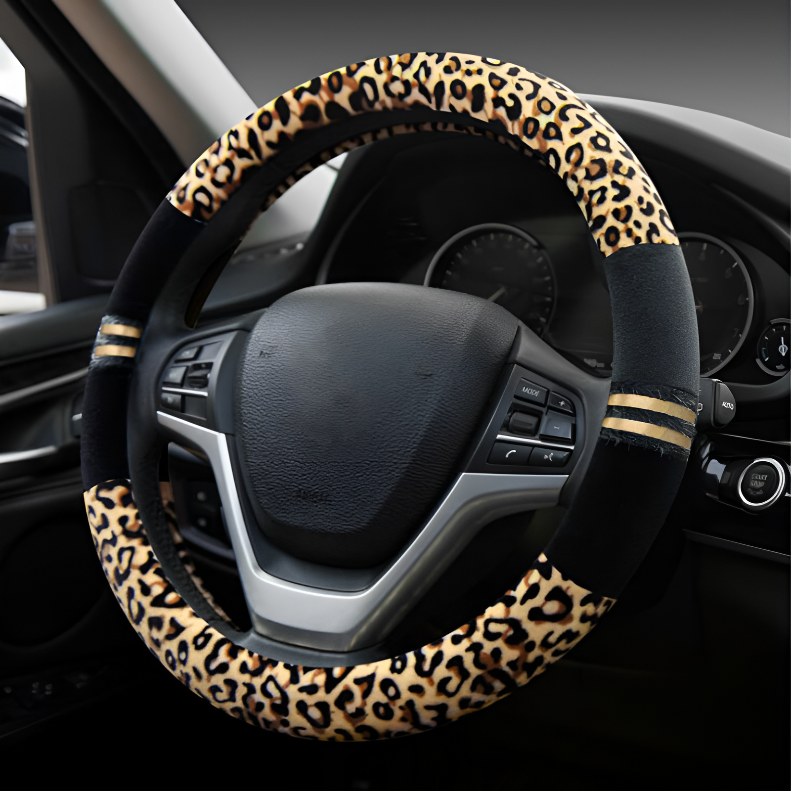Steering wheel cover with leopard print design on a car steering wheel