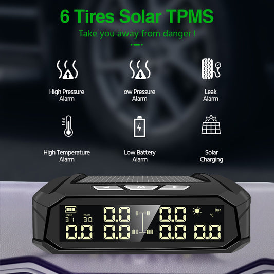 TPMS device with digital display and solar charging feature on a dark background
