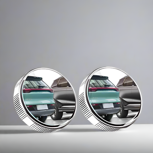 Two circular mirrors showing reflections of a car on a gray background